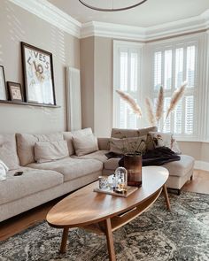 a living room filled with furniture and a rug