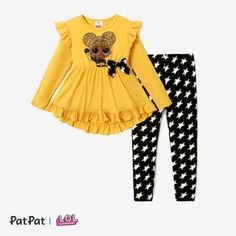 This adorable outfit features a stylish ruffled bow top paired with vibrant allover pants, perfect for any young L.O.L. SURPRISE! fan. The top is made from a soft blend of 62% polyester, 33% cotton, and 5% spandex, ensuring comfort and flexibility. The pants, crafted from 93% polyester and 7% spandex, offer a snug and comfy fit. Easy to care for, both pieces are machine washable and tumble dryable. Imported and officially licensed by MGA, this set guarantees high-quality and authentic design. Id Plaid Leggings, Bow Top, Bow Dress, Kid Character, Authentic Design, Dress Top, Comfy Fits, Dress With Bow, Outfit Sets