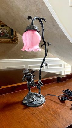 a lamp that is on top of a table