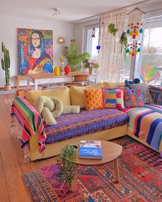 a living room filled with lots of colorful furniture