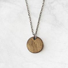 ★.  GET 20% OFF  .★Go to promo.alysonprete.com/code20WOOD CIRCLE PENDANT NECKLACEPendant size: .5" x .5" Chain length:- 16" + 2" extender- 18" + 2" extender **Message me for custom length**Gunmetal Alloy Chain with a lobster clasp. (Cadmium, nickel, and lead-free) Perfect little pendant necklace made of 1/8"  Birch wood. Simple, great for everydayEvery piece of wood is different, the grain in your jewelry may differ slightly from the wood in the photograph.Water resistant. Not recommended to wea Minimalist Brown Necklaces For Gifts, Minimalist Brown Necklace For Gift, Minimalist Brown Necklace For Gifts, Engraved Brown Necklace For Gift, Personalized Brown Necklace For Gift, Wood Pendant Necklace, Engraved Natural Wood Necklace As Gift, Engraved Natural Wood Necklace For Gift, Brown Wooden Necklace Gift