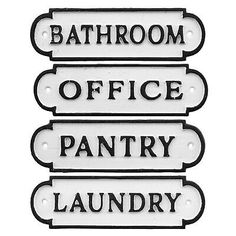 three signs that say bathroom, office, pantry and laundry in black and white letters