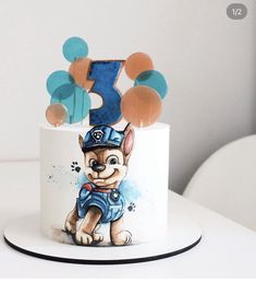 a birthday cake with an image of a dog on it