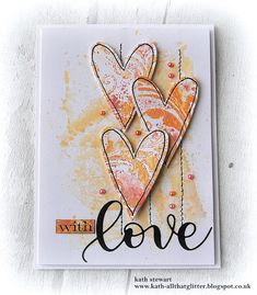 a close up of a card with two hearts