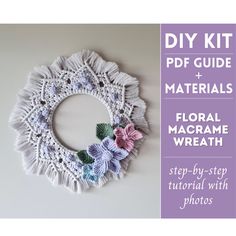 a crocheted doily wreath with flowers on it and the text, diy kit