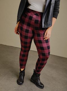 Our highly rated and expertly design legging has a stretch waistband that holds you in with a tummy-smoothing effect. Comfortably cast in a buffalo plaid pattern, these leggings are sure to be a wardrobe essential. High waist. Wide stretch waistband. Tapered leg. Opaque - never see-through. CONTENT + CARE Cotton/spandex. Wash cold; dry low. Imported plus size leggings. SIZE + FIT Model is 5'9”, size 1 . 27” full length inseam. The best plus size women's full-length signature legging skinny & tap Ruched Leggings, Buffalo Plaid Pattern, Evening Walk, Camo Designs, Gray Camo, Work Uniforms, Plus Size Leggings, Leggings Design, Bike Shorts