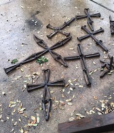 many crosses are laying on the ground