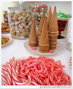 some candy canes and cones on a table