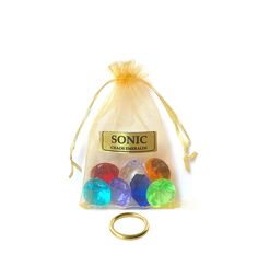 a bag filled with lots of different colored stones