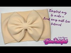 an image of a bow tie on top of a cloth napkin with the words, sunflower way to make a head wrap with low knoted