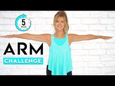 a woman standing in front of a white brick wall with her arms spread out and the words arm challenge