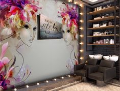 a salon with two chairs and a large wall mural on the wall, decorated with flowers