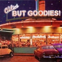 an advertisement for oldie's but goodies in front of a diner at night