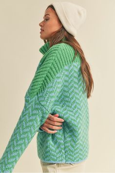 Stay warm and look great with this cozy Alpine Chevron Turtle Neck Sweater! Made from a chevron knit fabric in cool ocean tones of blue and green, ribbed turtle neck, drop sleeves, and an oversized fit, this cute sweater looks as good as it feels. Snuggle in style! Color: Blue & Green Ribbed Turtle Neck Drop Shoulder Long Sleeves Waist Length Acrylic Cozy Green Textured Knit Sweater, Trendy Green Chunky Knit Sweater, Green Funnel Neck Sweater For Fall, Trendy Green Turtleneck Sweater, Green Funnel Neck Winter Sweater, Green Funnel Neck Sweater For Winter, Cozy Green Sweater For Cold Weather, Trendy Chunky Knit Turtleneck, Green Textured Knit Turtleneck Sweater