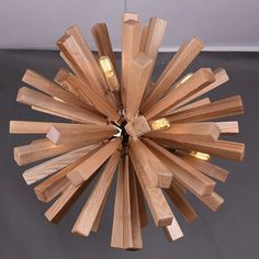 a wooden chandelier hanging from the ceiling