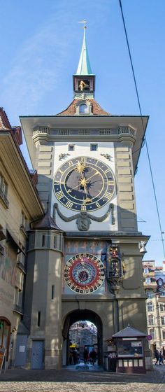 a large clock tower on the side of a building