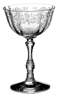 an ornate glass bowl is shown in this black and white photo, with the bottom half cut out