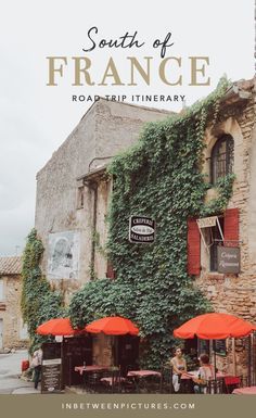 an old building with red umbrellas in front of it and the words south of france road trip itinerary