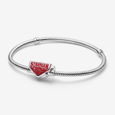 Celebrate loyalty, friendship and your love of Hawkins, with this exclusive Pandora x Stranger Things snake chain bracelet. Designed with a clasp engraved with "FRIENDS DON'T LIE" on one side, and the Stranger Things logo on the other, fill this meaningful piece with your favourite symbols and characters. - Pandora Stranger Things Clasp Snake Chain Bracelet - Enamel / Sterling silver / Red - Sz. 6.7 in Red Sterling Silver Jewelry For Friendship, Charms Disney, Stranger Things Logo, Pandora Essence, Bracelet Tennis, Snake Chain Bracelets, Halloween Jewelry, Pandora Bracelet, Snake Chain