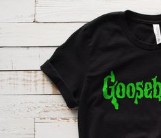 VACATION TIME, I'll be taking a few days off from March 20-26. All orders will continue processing when I get back from vacation. We'll be back with NEW launches soon after, so be sure to follow our IG so you don't miss out! Goosebumps Short-Sleeve Unisex T-Shirt | 90's Shirt Halloween Shirt Fall Shirt | 2000's Shirt | Horror Shirt | Horror Gifts The first shop to offer this 90's classic Goosebumps shirt, beware of copycat shops! We appreciate your support! Don't get pinched this St. Patrick's D 90s Style Halloween Streetwear Top, 90s Halloween Screen Print Tops, 90s Style Halloween Screen Print Tops, 90s Style Halloween Tops With Screen Print, 90s Halloween T-shirt With Screen Print, Goosebumps Shirt, Boho Head Wrap, Extra Wide Headband, Jersey Headband