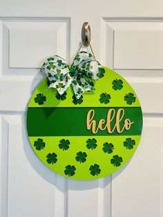 Shamrock Door Sign, St. Patrick's Day Door Sign, St. Patrick's Day Door Hanger, Shamrock Door Hanger, St. Patrick's Day Porch Decor, Spring Porch Decor, Door Sign, Door hanger, Shamrock Decor Shamrock Door Hanger, Neat Gift Ideas, Teacher Door Hangers, St Patricks Crafts, Drink Decorations, Woodwork Ideas, Bow Fabric, Hanger Crafts, Door Signs Diy