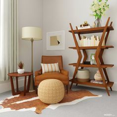 a living room filled with furniture and a cow hide rug on top of the floor