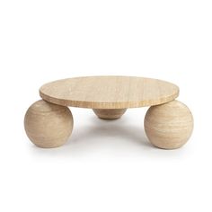 a small wooden table with two balls on the top and one ball at the bottom