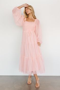 Step into elegance with our tulle maxi dress, complete with long sleeves and an adjustable waist belt. This enchanting dress combines grace and versatility, allowing you to effortlessly create a flattering silhouette for any occasion. Light Pink Modest Dress, Pink Smocked Dress, Long Sleeve Pink Bridesmaid Dress, Trendy Maxi Dresses, Pale Pink Dress, Magical Dress, Tulle Maxi Dress, Tulle Material