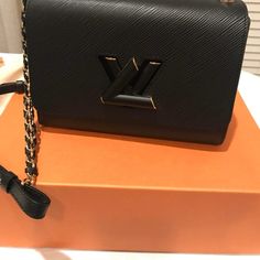 Black Medium Twist Shoukder Strap Bag, Great For Daytime Or Evening Wear. The Bag Is In Excellent Condition Like New. Luxury Black Luxe Shoulder Bag, Black Rectangular Monogram Shoulder Bag, Medium Twist, Luxury Black Shoulder Bag With Metal Logo, Black Louis Vuitton Bag 1stdibs, Louis Vuitton Black Monogram Bag, Strap Bag, Bags Black, Louis Vuitton Bags