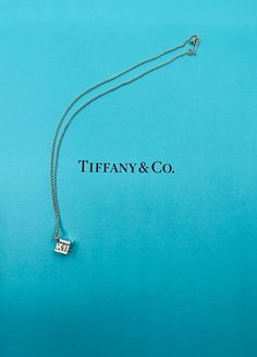 Authentic vintage Tiffany&Co. sterling silver atlas cube pendant necklace.  The chain is hallmarked  TIFFANY&Co. Condition: Pre-owned in very good condition. This item does not come with TIFFANY&Co box and pouch, Aquamarine Birthstone Ring, Tiffany And Co Box, Egyptian Cat Goddess, Cube Pendant, Aquamarine Birthstone, Vintage Tiffany, Tiffany And Co, Lovely Ring, Ring Fit