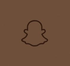 a brown snap icon with a black outline in the center on a dark brown background