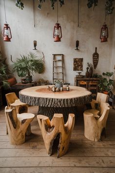 a wooden table surrounded by chairs and potted plants