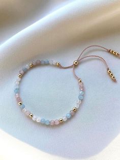 Delicate Adjustable Crystal Bracelet With Gemstone, Delicate Adjustable Crystal Gemstone Bracelet, Pastel Gemstone Beads Jewelry For Gifts, Dainty Pastel Jewelry As Gift, Dainty Pastel Jewelry For Gift, Dainty Pastel Jewelry Gift, Pastel Dainty Jewelry For Gift, Adjustable Rose Quartz Birthstone Jewelry, Pastel Round Beads Jewelry Gift