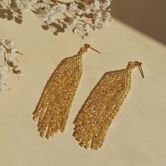 "Gold Statement Earrings, Bohemian Gold Earrings, Gold Summer Earrings, Gold Party Earrings, Gold Long Drop Bridal Earrings, Gold Drop Earrings, Gold Bridal Earrings, Stainless Steel Earrings, Gold Tassel Earrings Bright and elegant boho earrings with fringe for real fashionistas. Earrings are not heavy, very comfortable. These earrings are the perfect finishing touch in your bohemian wardrobe. - Earrings are available in all colors shown in the pictures. If you want a different color, just spec Gold Earrings With Latkans And Round Beads, Gold Beaded Danglers For Celebration, Gold Beaded Bridal Earrings For Celebration, Gold Bohemian Earrings With Fringe, Bohemian Gold Tassel Earrings With Fringe, Bohemian Gold Beaded Fringe Earrings, Gold Beaded Fringe Tassel Dangle Earrings, Gold Bohemian Beaded Fringe Earrings, Gold Tassel Earrings