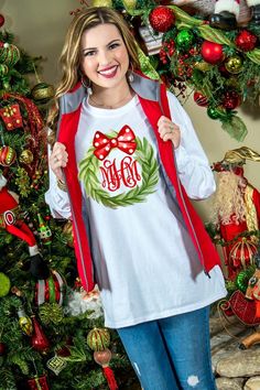 Nothing says Christmas like our monogrammed Christmas wreath tee shirt! Choose from short sleeve tee, long sleeve tee or even a sweatshirt! We are sure to have the perfect tee style for you. This monogrammed wreath is adorned with the cutest polka dot bow and of course your monogram in the center! Choose from an interlocking or circle font to personlize your Christmas shirt just the way that you love it! Monogram Christmas Wreath, Christmas Monogram Shirt, Wreath With Bow, Bow Graphic, Christmas Wear, Monogram Shirts, Christmas Monogram, Long Sleeve Tank Top, Matching Tees