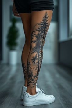 a woman's legs with pine trees on them