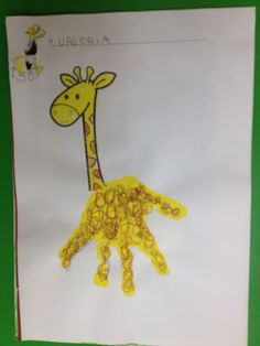 a child's drawing of a giraffe on paper