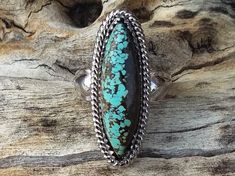 WANTED all over the Universe. Turquoise is recognized Sought After by early KINGS, MOVERS, and SHAKERS! Turquoise is said to be a vessel Imbued with energies associated with Heaven! All My Turquoise is Carefully chosen from around the World. I love the Raw Authentic look and feel of the stone...so I do not over polish the Turquoise! True Bohemian Style...an Original work of Art that you can treasure for a lifetime! Each of My Creations are One of A Kind and are Hand wrought to bring out the best Handmade Rustic Oval Jewelry, Untreated Bohemian Turquoise Ring, Collectible Bohemian Turquoise Ring, Bohemian Oval Turquoise Ring For Jewelry Making, Bohemian Oval Rings With Patina, Bohemian Oval Turquoise Collectible Ring, Bohemian Handmade Collectible Rings, Untreated Round Turquoise Bohemian Ring, Handmade Rustic Silver Turquoise Ring