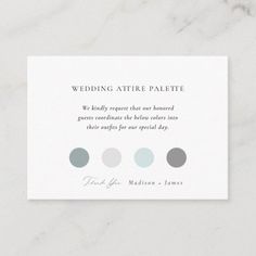 the wedding attire palette card is shown on top of a white marble surface with grey and blue circles