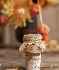 a jar filled with some kind of stuff on top of a table