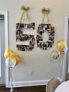 some balloons and pictures hanging on the wall