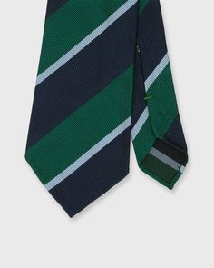 It doesn't get much more classic (or easy-to-wear) than a striped tie. The stripes on this one run the English way — left down to right, heart to sword — per regimental tradition. It's hand-rolled in Italy in our forever-go-to 8cm width: not too skinny, not too fat, and designed to sit in perfect harmony with both the lapel of our jackets and the length of our shirt collars. Shirt Collars, Tuxedo Shirts, Stripe Silk, Hand Roll, Perfect Harmony, Striped Tie, Sweaters And Jeans, The English, Free Bag