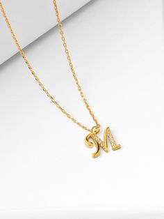 Introducing our Sterling Silver Letter Necklace, a delicate expression of personal style. This Tiny Initial Necklace features the letter "M," elegantly crafted to adorn your neckline with subtle charm. Plated in lustrous gold, this Dainty Initial Necklace adds a touch of sophistication to any outfit. Embrace individuality with this Small Monogram Necklace, a timeless accessory that speaks volumes in its simplicity. 🌸  Each piece is meticulously crafted, offering a unique and intimate touch. Ide Initial M Necklace, M Initial Necklace, Letter M Necklace, Silver Letter Necklace, Bracelet Stands, Letter Necklace Silver, M Necklace, Dainty Initial Necklace, Initial Necklace Gold