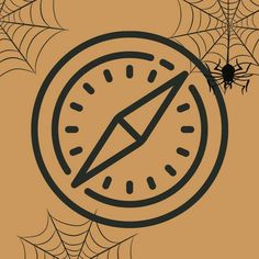 a spider sits on top of a clock in the center of a cobwel