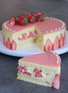 two slices of cake with strawberries on top