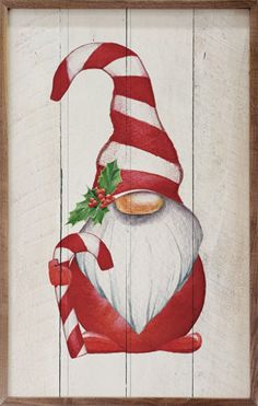 a painting of a santa clause with candy canes on it's nose and hat