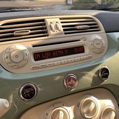 there is a radio in the dashboard of a car that reads, i'm luv with u