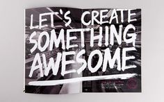 an open book with the words let's create something awesome on it