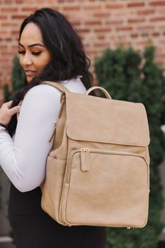 Our Diaper Bag is 100% Faux Vegan Leather with hand-crafted stitching and zippers. It's stylish design and durability makes it your go-to for every occasion. It's multi-purpose, serving as a diaper bag, purse, handbag, backpack, tote bag, laptop bag, carry on luggage, and much more. You will not sacrifice style or functionality with this all in one bag! On-the-go Diaper Backpack With Zipper, Backpack Diaper Bag With Zipper Closure For On-the-go, Standard Leather Backpack With Zipper Closure For Errands, Standard Leather Backpack With Zipper For Errands, Leather Backpack With Zipper Closure For Errands, Modern Backpack With Zipper Closure And Double Handle, Everyday Use Diaper Bag Backpack With Zipper Pocket, Modern Diaper Bag Backpack With Zipper, Versatile Everyday Diaper Bag With Zipper Pocket