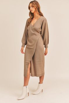 Long sleeve sweater knit midi wrap dress. Dress can be worn in multiple ways and also as an open cardigan. Elegant Fall Sweater Dress For Day Out, Knit Sweater Dress For Winter Day Out, Chic Soft Knit Sweater Dress For Spring, Soft Knit Dresses For Fall, Soft Knit Fall Dresses, Knee-length Knit Sweater Dress For Loungewear, Chic Knit Sweater Dress For Fall, Knit Sweater Dress For Loungewear, Chic Fall Midi Dress With Surplice Neckline